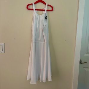 Classy, white , flowy halter mini dress . Express never worn.